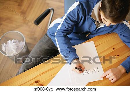 Man writing a word on paper View Large Photo Image Stock Photography - Man writing a word on paper. Fotosearch