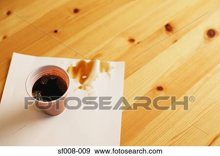 Plastic cup and spilt coffee View Large Photo Image Stock Photo - Plastic cup and spilt coffee. Fotosearch