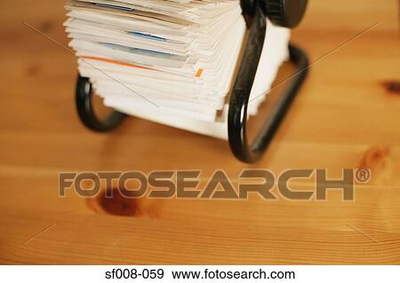 Stock Photo - Rotary card file on a desk. Fotosearch