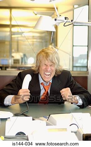 Picture - Angry businessman. Fotosearch