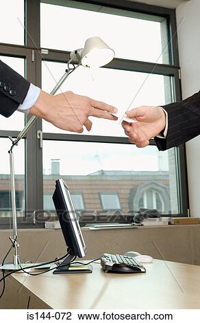 Businessmen exchanging cards View Large Photo Image Stock Image - Businessmen exchanging cards. Fotosearch