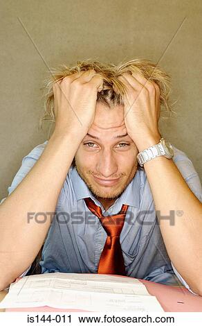 Office worker with head in hands View Large Photo Image Stock Image - Office worker with head in hands. Fotosearch