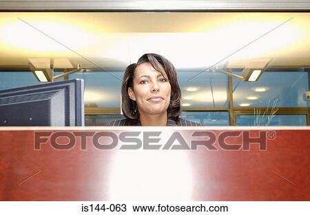 Stock Image - Portrait of receptionist. Fotosearch