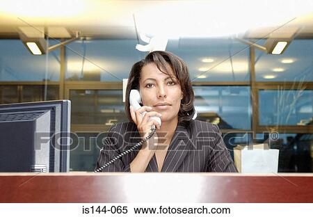 Stock Photography - Portrait of receptionist. Fotosearch