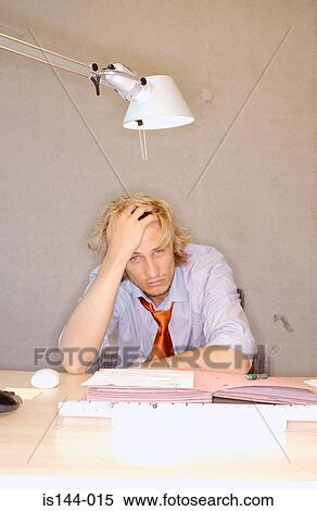 Stressed office worker View Large Photo Image Stock Photography - Stressed office worker. Fotosearch