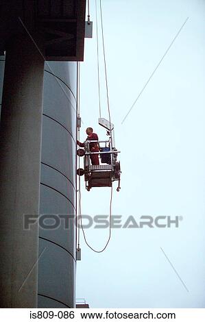 Window cleaning on skyscraper View Large Photo Image Stock Photograph - Window cleaning on skyscraper. Fotosearch