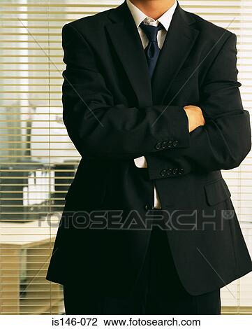 Businessman with arms crossed View Large Photo Image Stock Image - Businessman with arms crossed. Fotosearch