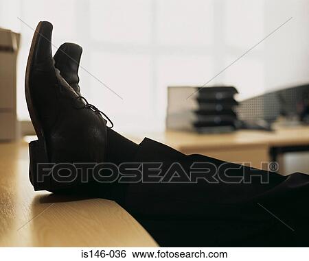 Businessman with feet on desk View Large Photo Image Stock Photograph - Businessman with feet on desk. Fotosearch