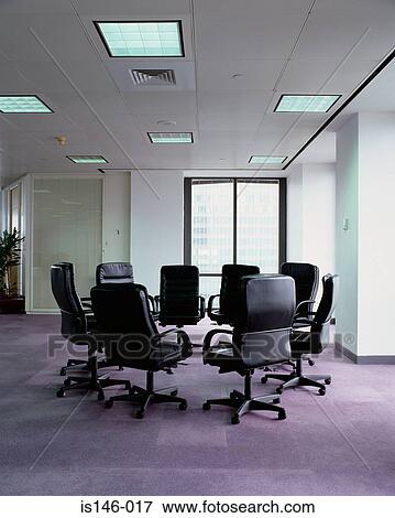 Stock Photo - Empty office chairs in a circle. Fotosearch