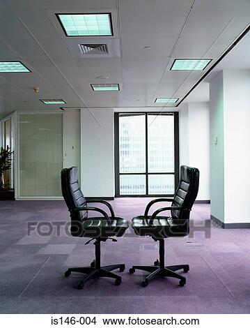 Pair of empty office chairs View Large Photo Image Picture - Pair of empty office chairs. Fotosearch