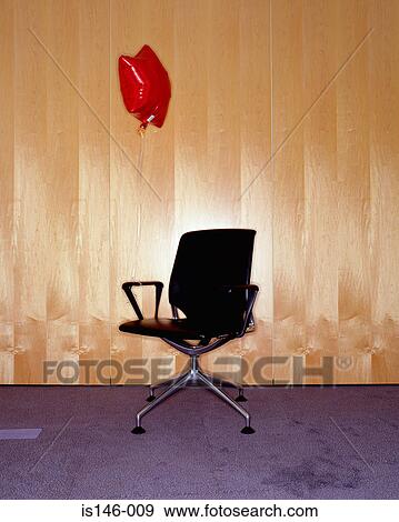 Plant and desk lamp in office View Large Photo Image Stock Photo - Plant and desk lamp in office. Fotosearch