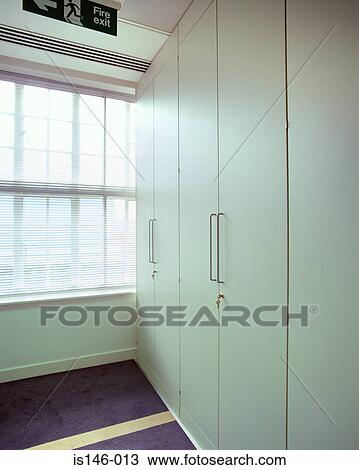 Stock Image - Row of cupboards in office. Fotosearch