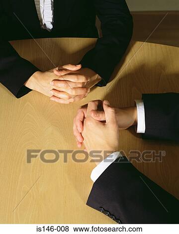 Two businessmen in a meeting View Large Photo Image Stock Photo - Two businessmen in a meeting. Fotosearch