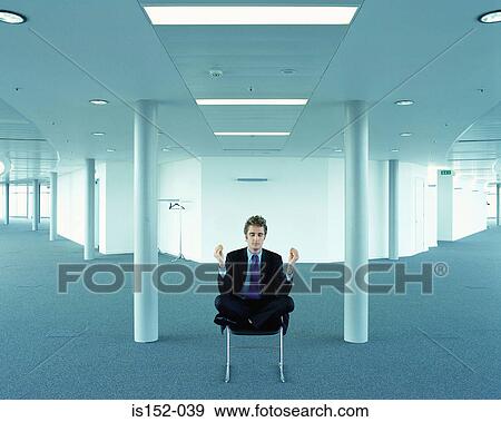 Stock Photo - Businessman in the lotus position. Fotosearch