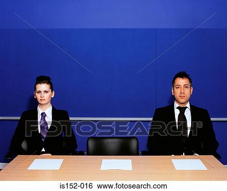 Stock Photograph - Businesspeople in conference room. Fotosearch