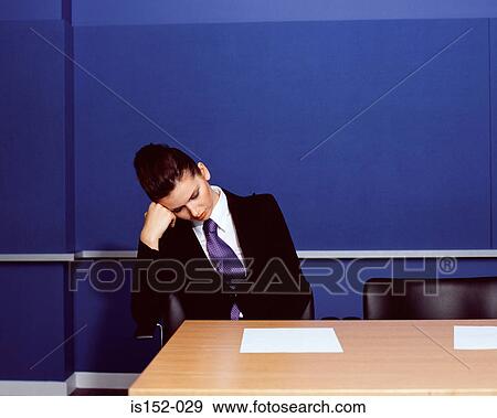 Businesswoman sleeping in office View Large Photo Image Stock Photo - Businesswoman sleeping in office. Fotosearch