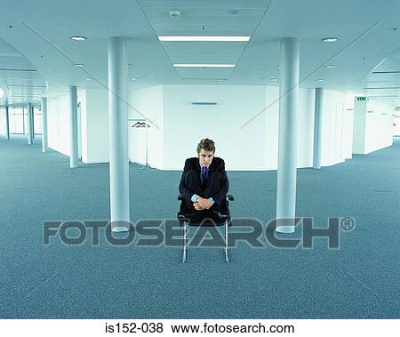 Scared looking businessman View Large Photo Image Stock Photo - Scared looking businessman. Fotosearch