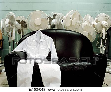 Stock Photo - White overalls on sofa. Fotosearch