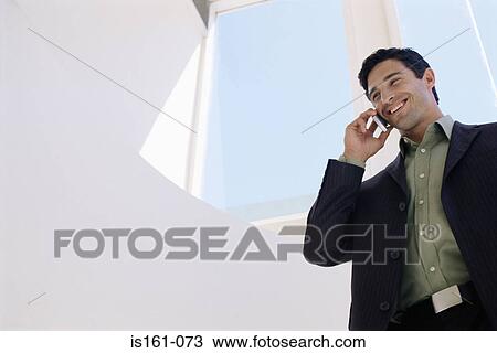 Businessman on mobile phone View Large Photo Image Stock Image - Businessman on mobile phone. Fotosearch