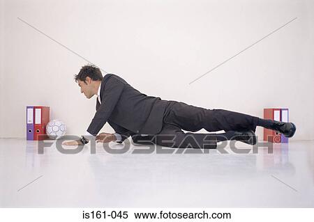 Businessman playing football View Large Photo Image Stock Photography - Businessman playing football. Fotosearch