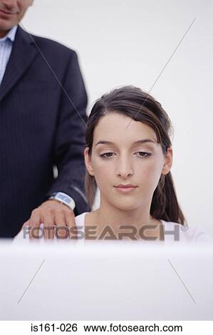 Man with his hand on woman's shoulder View Large Photo Image Stock Photograph - Man with his hand on woman's shoulder. Fotosearch