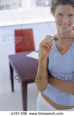 Woman behind diagram drawn on glass View Large Photo Image Stock Photo - Woman behind diagram drawn on glass. Fotosearch