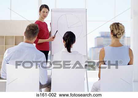 Woman giving a presentation View Large Photo Image Stock Image - Woman giving a presentation. Fotosearch