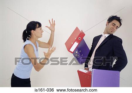 Woman throwing folders at man View Large Photo Image Stock Photograph - Woman throwing folders at man. Fotosearch