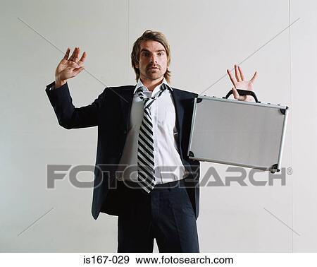 Stock Photo - Businessman surrendering. Fotosearch
