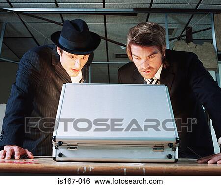 Gangsters looking in briefcase View Large Photo Image Stock Photograph - Gangsters looking in briefcase. Fotosearch