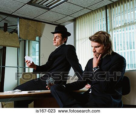 Stock Image - Gangsters playing cards. Fotosearch