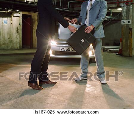 Gangsters swapping briefcases View Large Photo Image Stock Photography - Gangsters swapping briefcases. Fotosearch