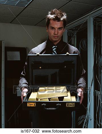 Man with briefcase of gold bars View Large Photo Image Stock Image - Man with briefcase of gold bars. Fotosearch
