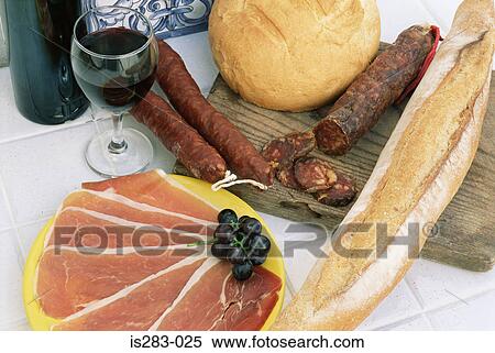 Stock Photography - Cold meats with bread and wine. Fotosearch