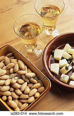 Sherry almonds and manchego cheese View Large Photo Image Picture - Sherry almonds and manchego cheese. Fotosearch