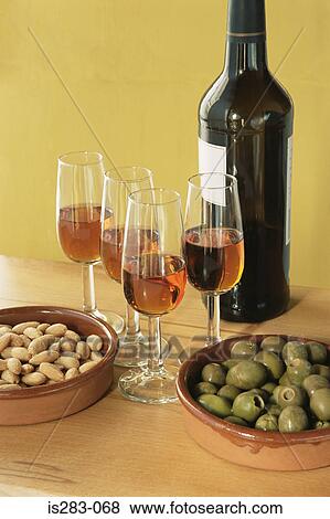 Stock Photo - Sherry almonds and olives. Fotosearch