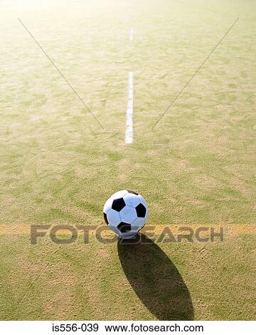 Football on astroturf field View Large Photo Image Stock Photo - Football on astroturf field. Fotosearch