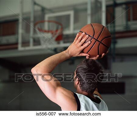Stock Photo - Male basketball player. Fotosearch