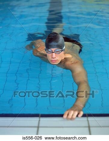 Male swimmer in pool View Large Photo Image Stock Photograph - Male swimmer in pool. Fotosearch