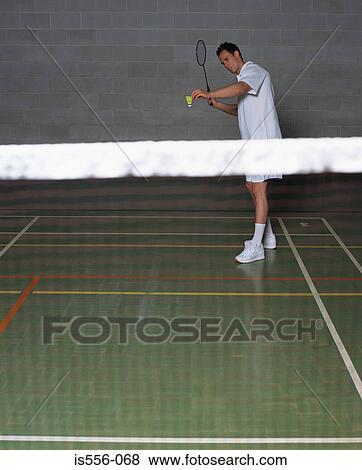 Man playing badminton View Large Photo Image Stock Photo - Man playing badminton. Fotosearch