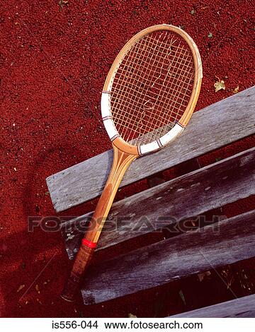 Tennis racket on bench View Large Photo Image Picture - Tennis racket on bench. Fotosearch