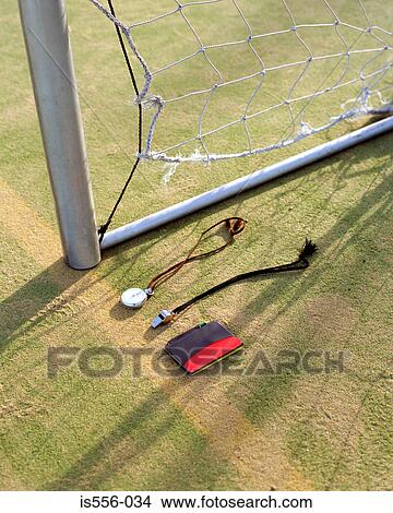 Whistle and stop watch in goal View Large Photo Image Picture - Whistle and stop watch in goal. Fotosearch