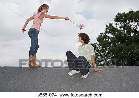 Angel casting a spell on a man View Large Photo Image Picture - Angel casting a spell on a man. Fotosearch