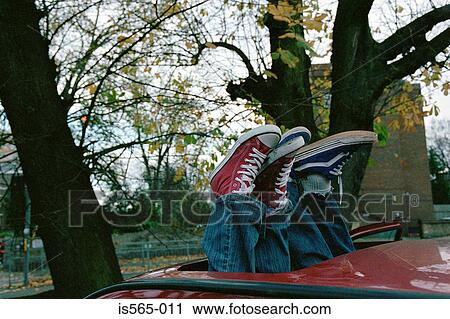 Trainers through automobile sunroof View Large Photo Image Stock Image - Trainers through automobile sunroof. Fotosearch