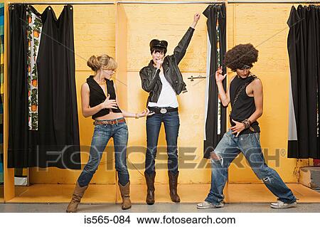 Young woman singing in changing room View Large Photo Image Picture - Young woman singing in changing room. Fotosearch