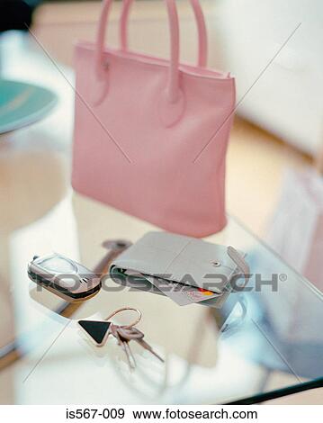 Stock Photo - Items on glass table. Fotosearch