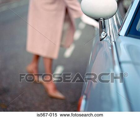 Woman opening automobile door View Large Photo Image Stock Photography - Woman opening automobile door. Fotosearch