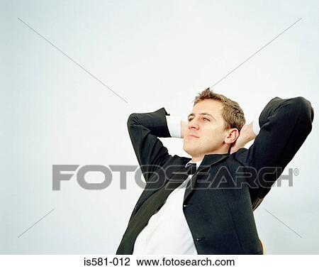 Businessman relaxing View Large Photo Image Stock Image - Businessman relaxing. Fotosearch