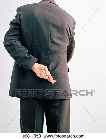 Businessman with fingers crossed View Large Photo Image Stock Image - Businessman with fingers crossed. Fotosearch