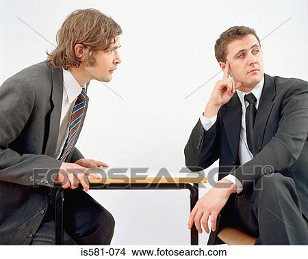 Businessmen in meeting View Large Photo Image Picture - Businessmen in meeting. Fotosearch